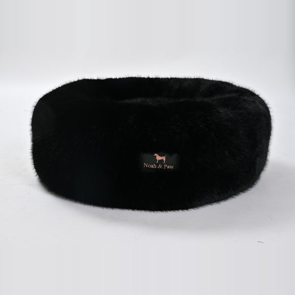Black donut dog bed side view