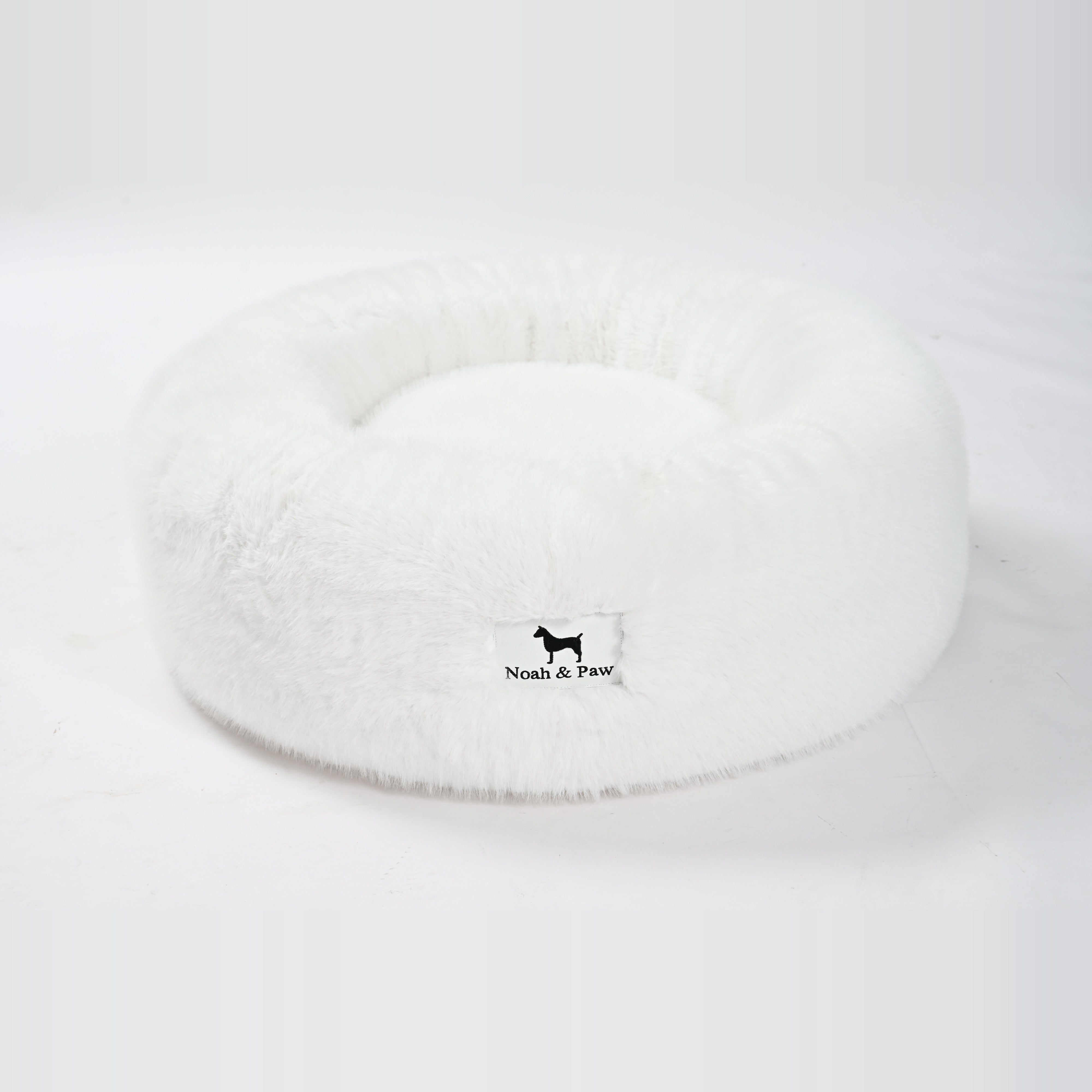 White donut dog bed side view