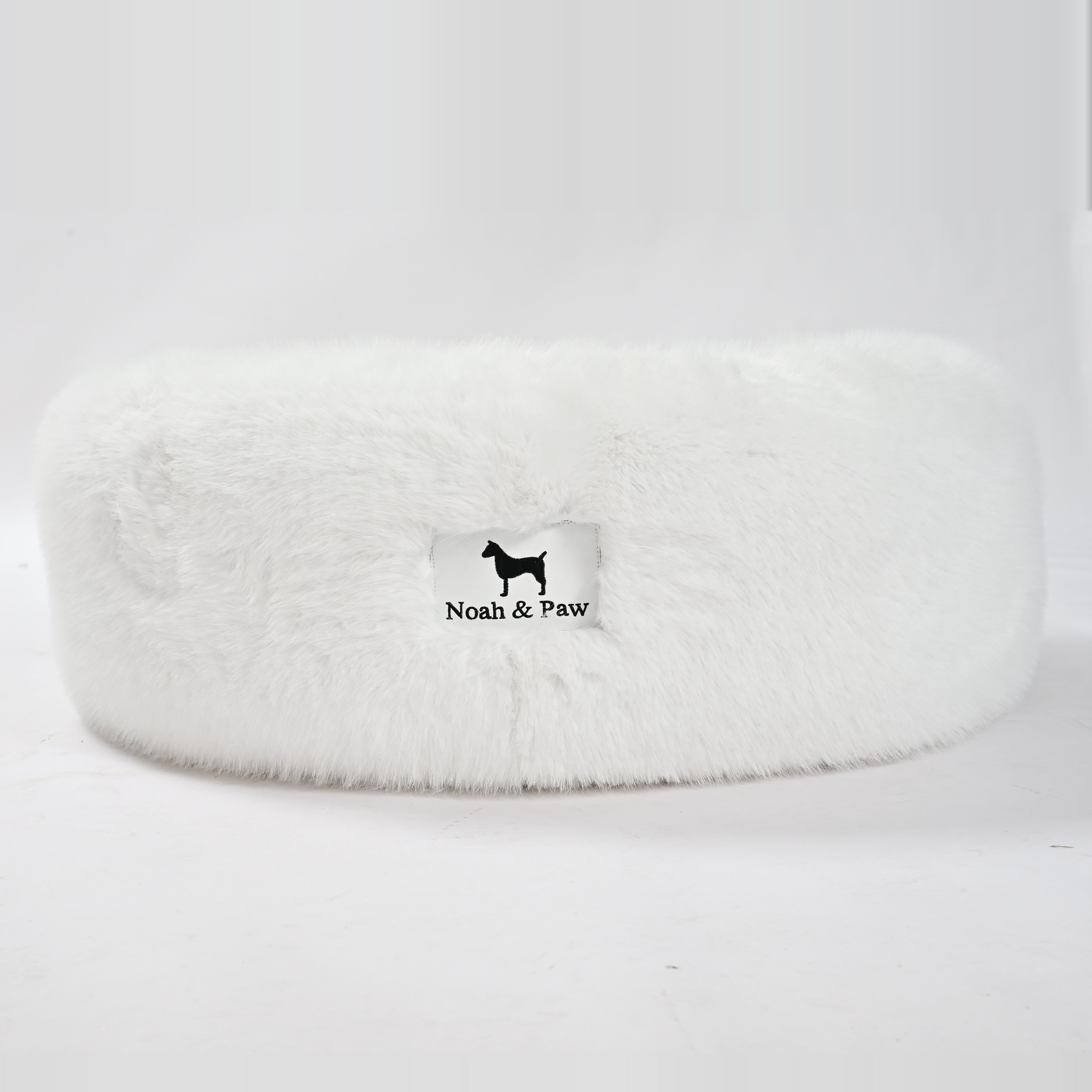 White donut dog bed side view