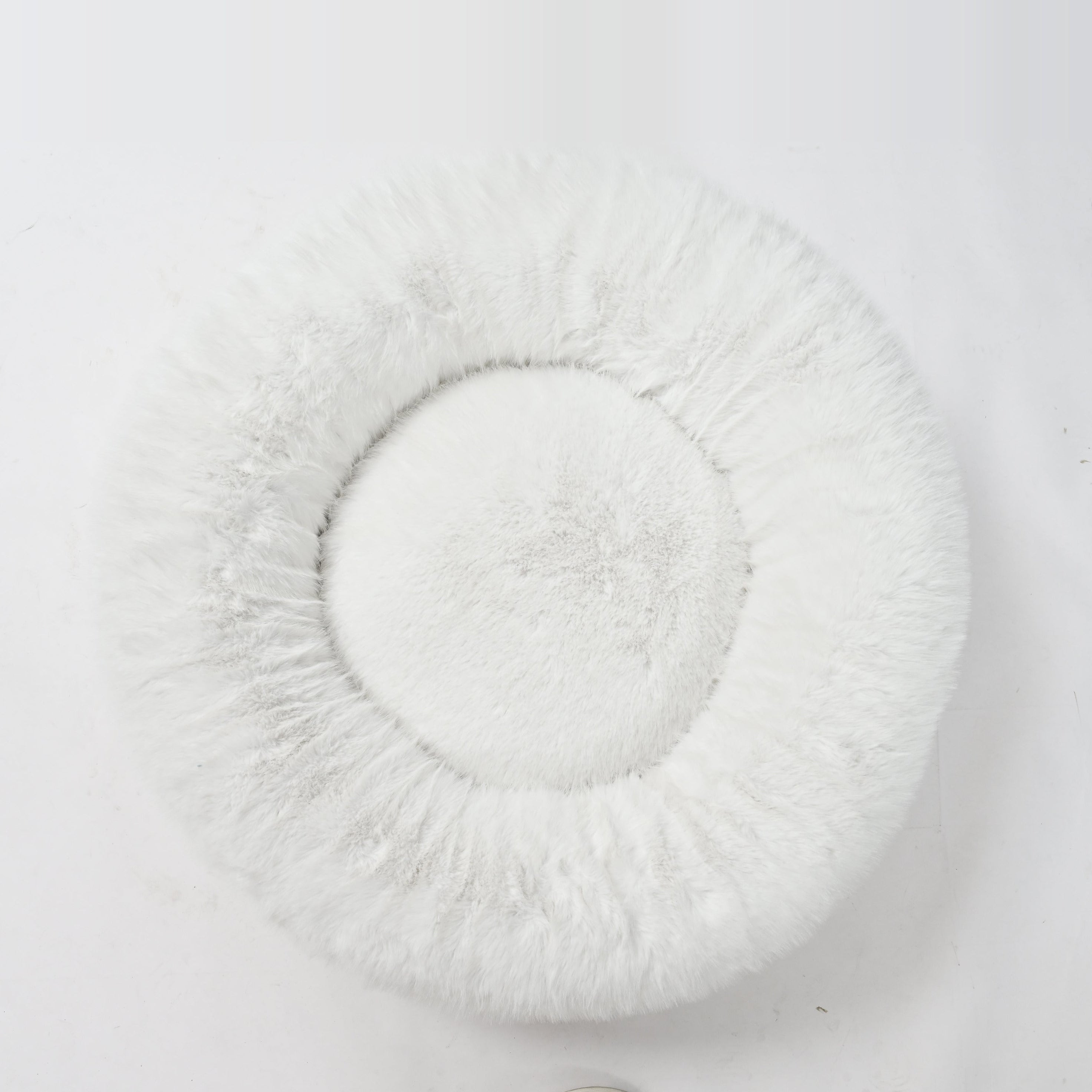 White donut dog bed top view