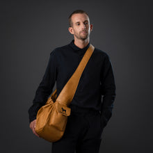 Noah & Paw ruffle style dog sling carrier in vegan leather, camel