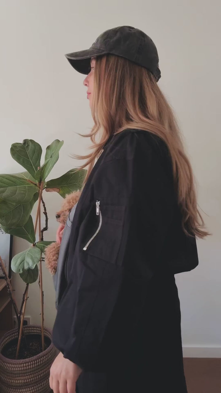 Video: Noah & Paw dog sling carriers in twill snap style and vegan leather 3x safety zipper style worn with a small dog